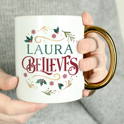 Personalised Believes In Christmas Gold Handled Ceramic Mug